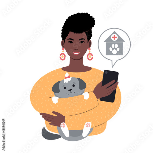 young african woman with a tiny dog searching for veterinarian online from smartphone.