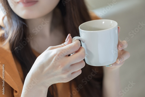 Woman drinking hot drink