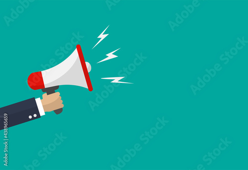 Hand businessman megaphone with copy space on blue background. Advertising through speakers. Vector illustration in flat design.