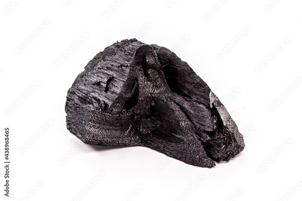 Obraz premium piece of wood-based charcoal, charcoal, with isolated white background
