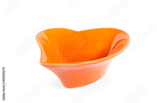 Empty orange bowl on white background