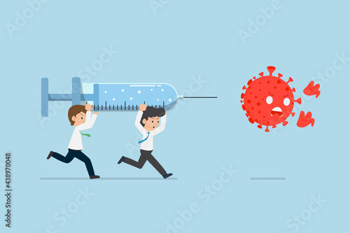 Man carrying Large Syringes of Vaccine Injects Coronavirus COVID