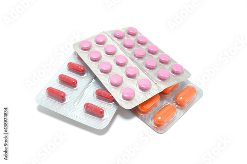 Pills in blister close-up on white background. Medicine, diseases, medicines, clinic, prescription, health