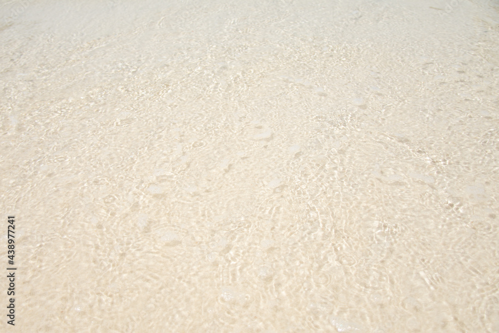 beautiful soft wave on sand at the sea sunny day. subject is blurred. beautiful soft wave on sand at the sea sunny day. subject is blurred.