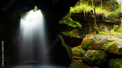 Unique natural waterfall shower  in the Garden of Caves, Meghalaya, India photo