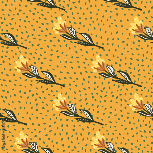 Modern floral seamless pattern with green and yellow colorred flower elements. Orange dotted background. photo