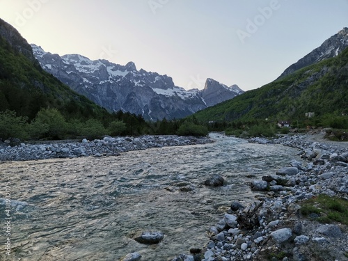 wild river with crystal clear water in theth albanian alps in spring