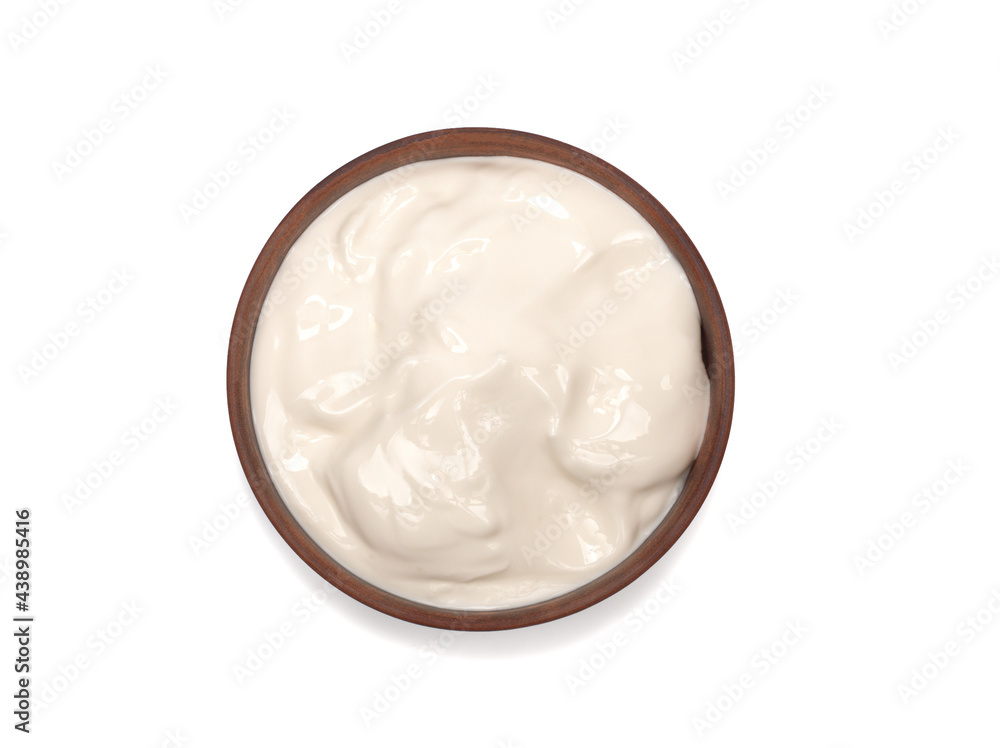 Some sour cream in a plate, white background Some sour cream in a plate, white background