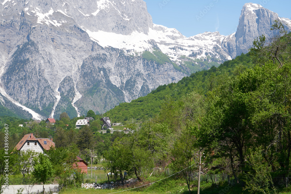 Mountain landscape with houses and farms in Theth in the Albanian alps