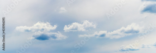 Small fluffy clouds in the sky in cloudy weather  panorama