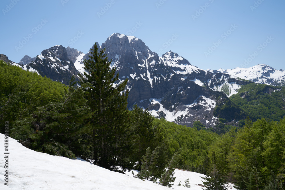 Mountain landscape in the remote village of Theth, hiking path from theth to valbona Mountain landscape in the remote village of Theth, hiking path from theth to valbona