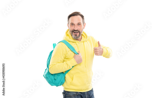 happy mature man carry school bag or backpack isolated on white show thumb up, back to school.