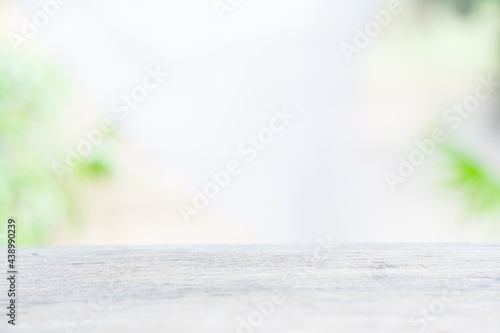 Wood table top on blur garden background