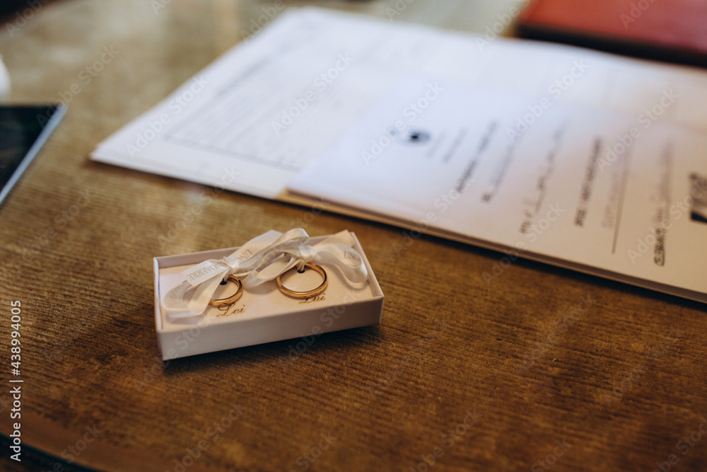 Wedding rings in a beautiful box. Wedding details for the ceremony. Wedding rings in a beautiful box. Wedding details for the ceremony.