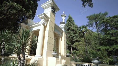 beautiful european architecture in a large green park 