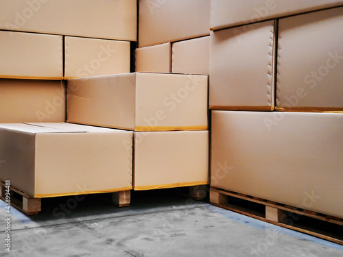 Stacks of boxes in industrial factory photo