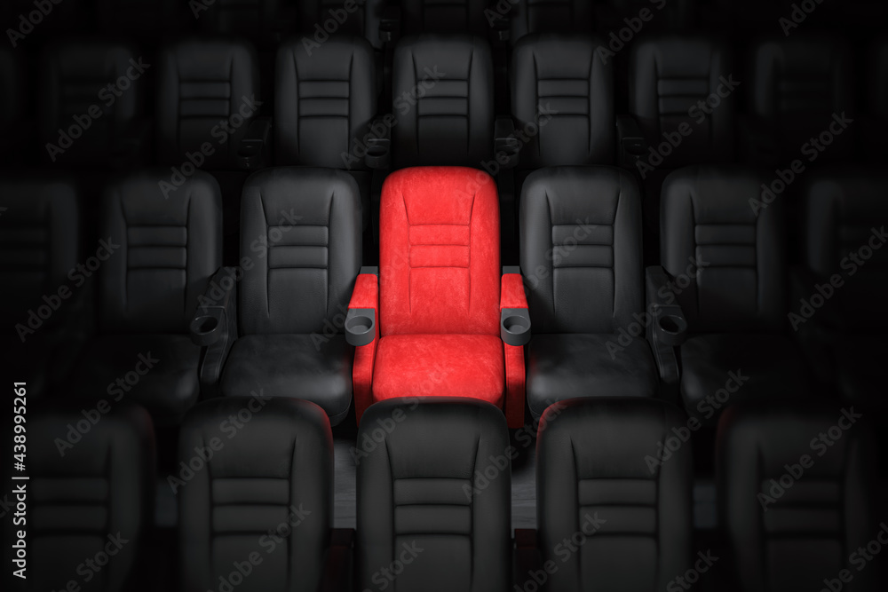 Fototapeta premium One red empty seat among others black seats in cinema hall.