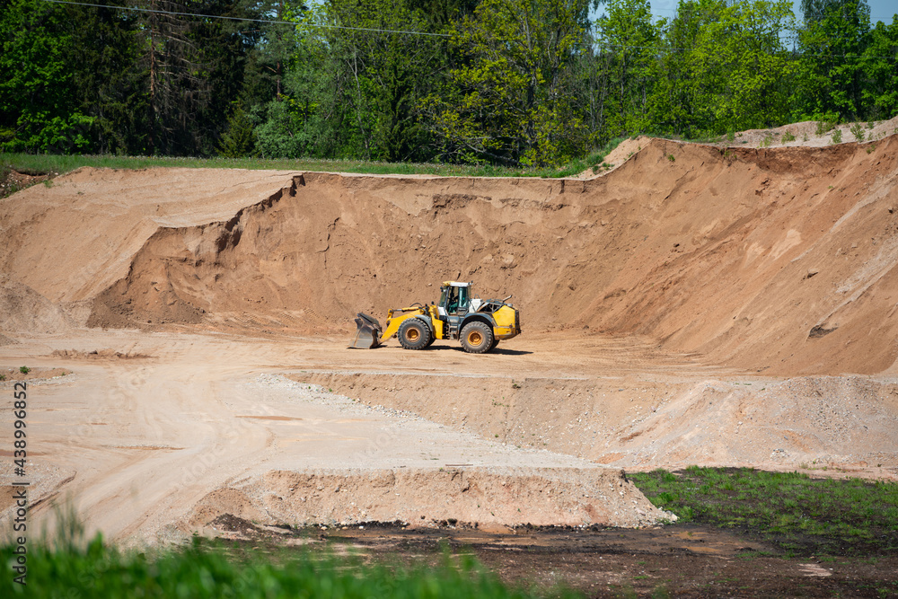 Quarry aggregate with heavy duty machinery. Construction industry. Horizontal Quarry aggregate with heavy duty machinery. Construction industry. Horizontal