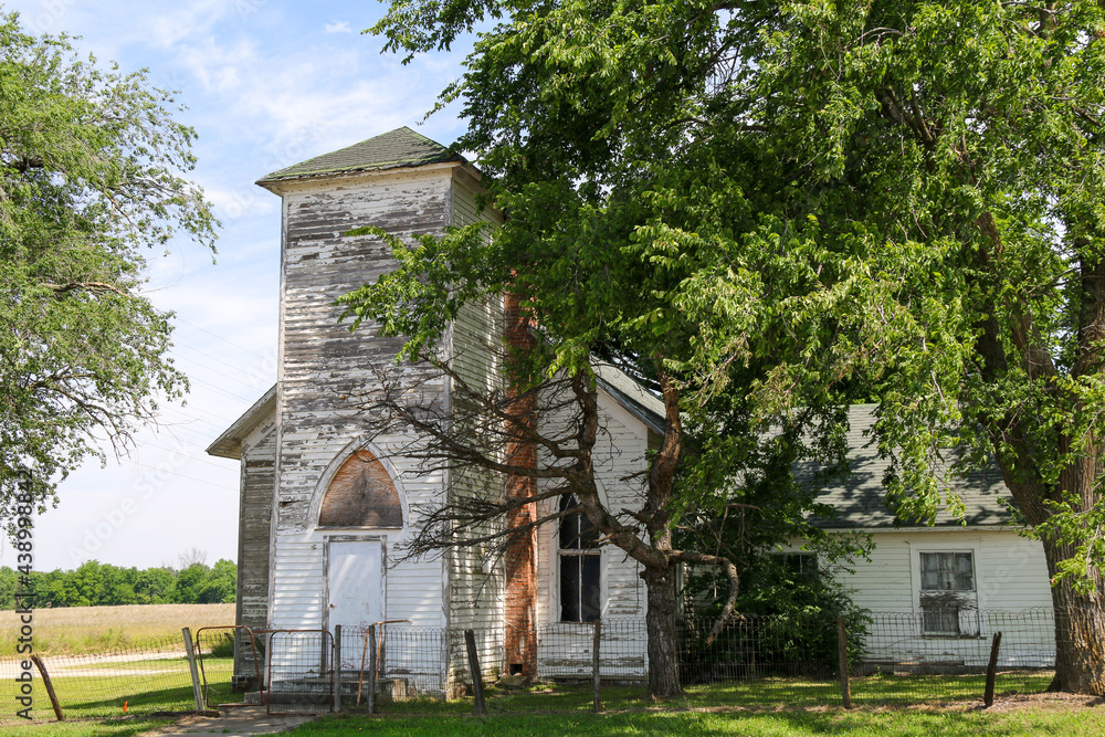 abandoned rural village countryside church worship building boarded up and empty