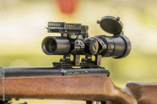 Wooden sniper rifle with scope and bipod
