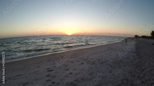 Wallpaper Mural Captiva Sanible Island aerial at sunset fly low over beach to ocean waves and sunset  Torontodigital.ca