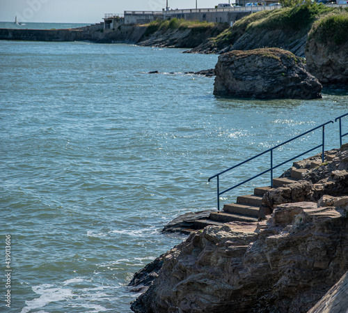 Vendée, FRANCE: Photo of a staircase access to descend into the bay of Boisvinet at Saint Gilles Croix de Vie, May 2021.  photo