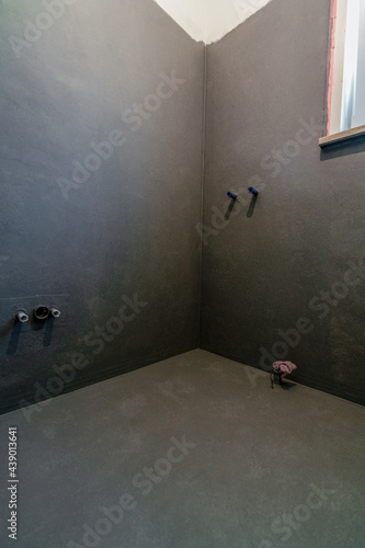 Bathroom walls prepared for tiling