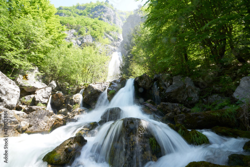 beautiful waterfall in the hiking destination theth in the albanian alps