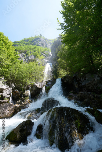 beautiful waterfall in the hiking destination theth in the albanian alps