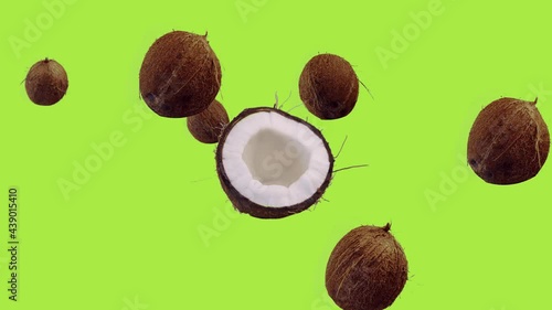 Title: Coconuts Flying and Floating in the Air on the Chromakey Green Background
