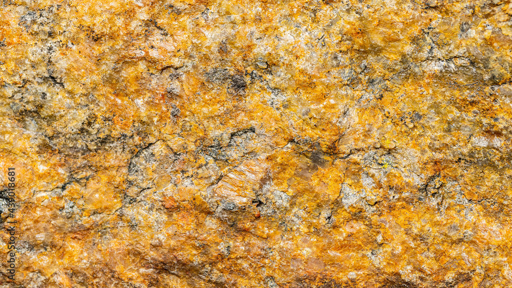 Background of granite. Texture of brown granite stone. Weathered stone surface. Copy space Background of granite. Texture of brown granite stone. Weathered stone surface. Copy space