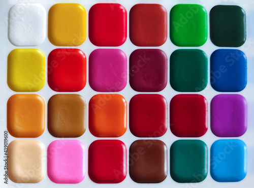 Colored watercolor background. Makeup paints.
