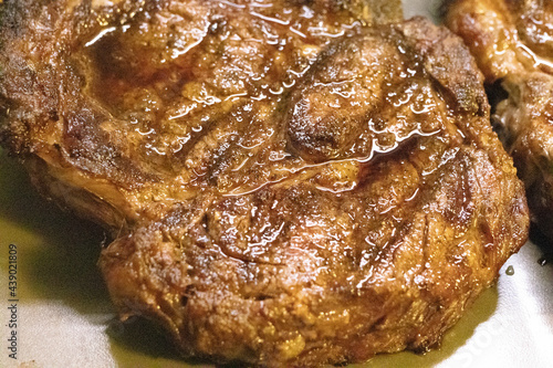 Close up view of BBQ grilled Steak with juices