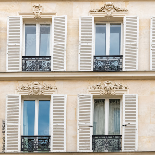 Paris  beautiful facade in the Marais  detail of the windows 