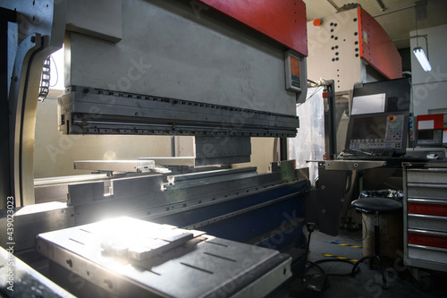 CNC Plasma cutter machine in big metal industrial hall