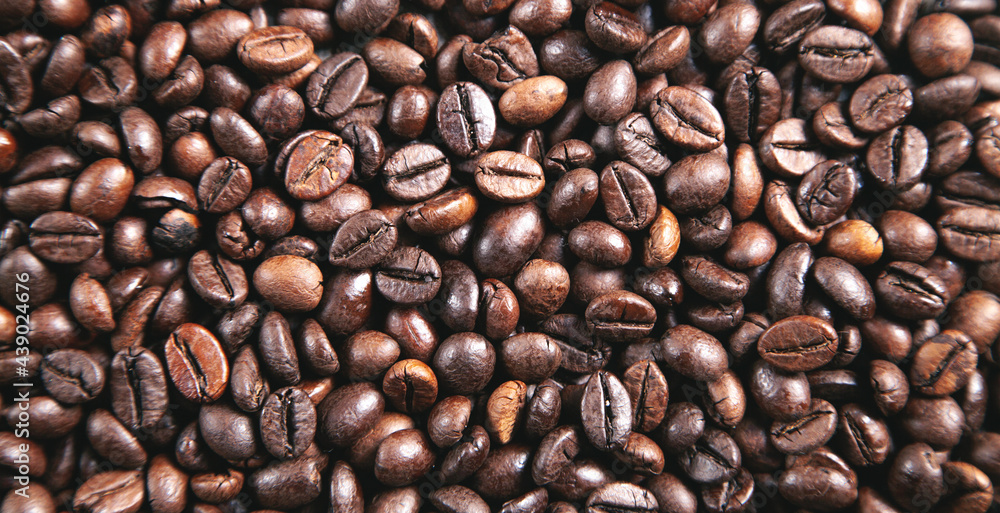 Obraz premium Coffee beans background. Dark coffee background