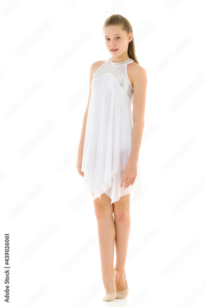 Pretty Smiling Girl Gymnast in White Sport Dress Standing on Tip Pretty Smiling Girl Gymnast in White Sport Dress Standing on Tip