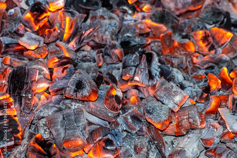 Background of red and black beautiful coals close-up for design. Background of red and black beautiful coals close-up for design.