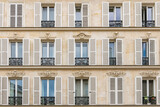 Paris, beautiful facade in the Marais, detail of the windows 