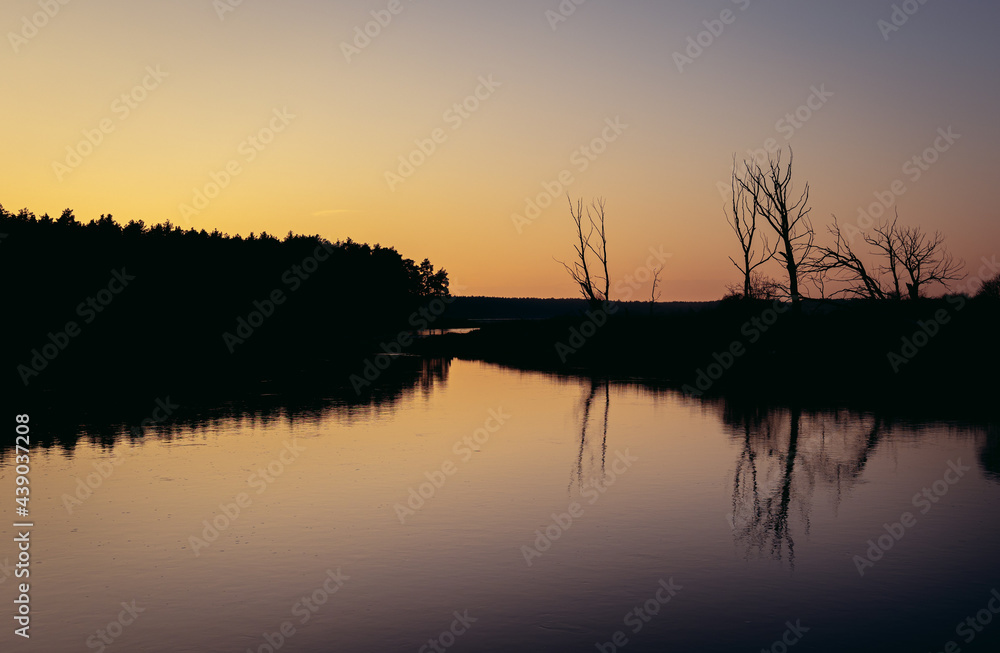 Sunset over Bug river, viewpoint near Szumin, small village in Masovian Voivodeship of Poland