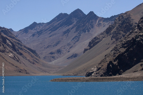 Alpine landscape. The deep blue color water glacier lake very high in the mountains. 