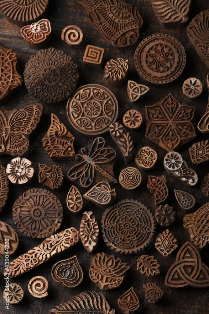 .Mixed traditional Indian wood block pattern for textile printing on rustic wood background