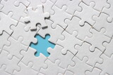 Jigsaw puzzle with missing piece. Missing puzzle pieces. Concept image of unfinished task. Completing final task, missing jigsaw puzzle pieces and business concept with a puzzle piece missing. blue