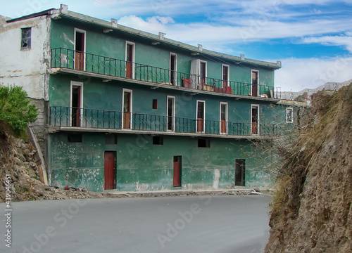 Alausi, town in the Chimborazo province of Ecuador, colorful old buildings close to Devils Nose, Nariz del Diablo railway. © eskystudio