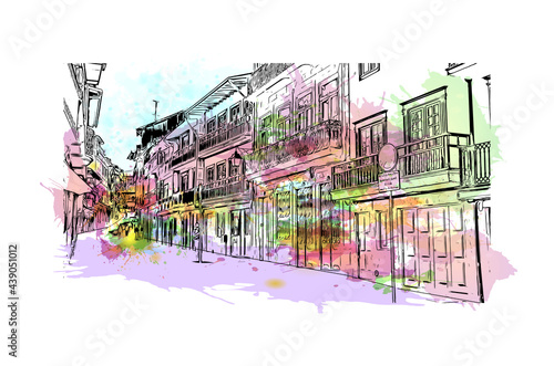 Building view with landmark of Guimaraes is a city in northern Portugal. Watercolor splash with hand drawn sketch illustration in vector.