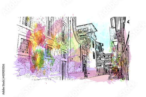 Building view with landmark of Guimaraes is a city in northern Portugal. Watercolor splash with hand drawn sketch illustration in vector.