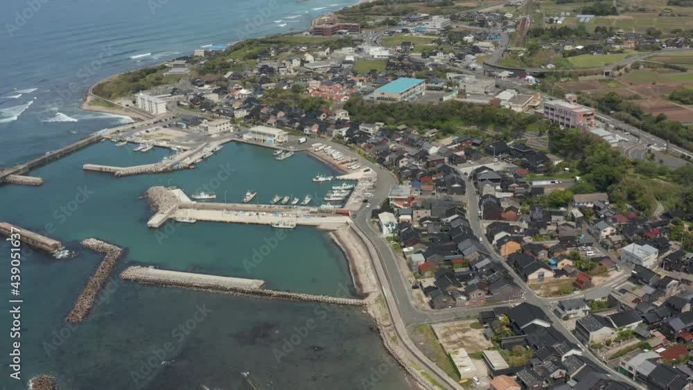 Daisen Town and Mikuriya Port, Tottori Prefecture Japan. High Aerial Pan Daisen Town and Mikuriya Port, Tottori Prefecture Japan. High Aerial Pan