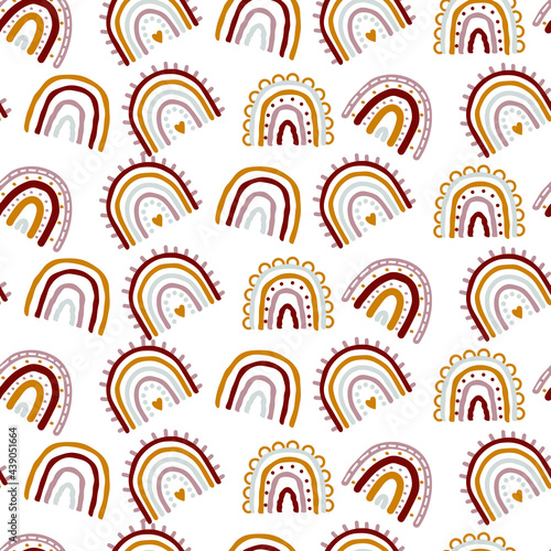 Hand drawn seamless pattern with rainbows
