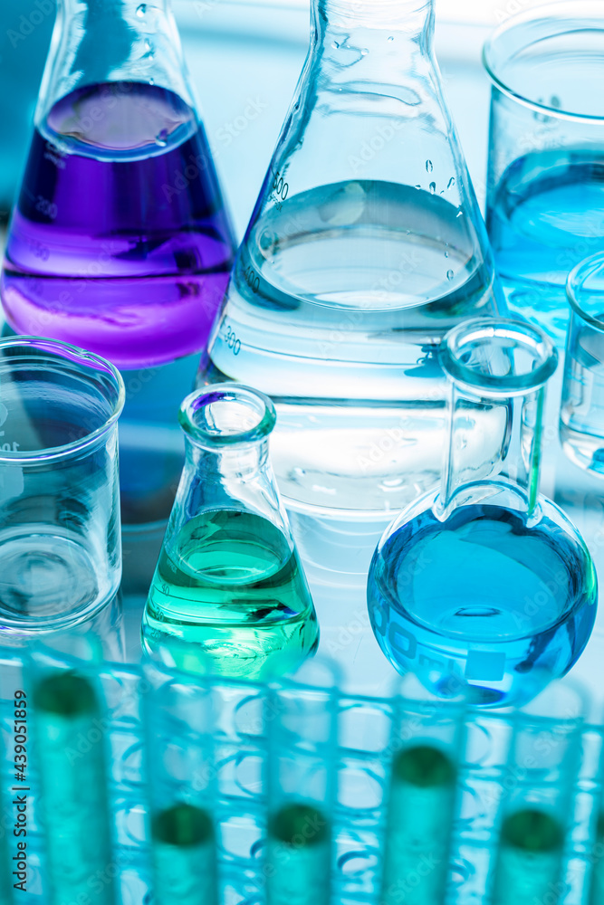 Close-up of laboratory glassware with liquids Close-up of laboratory glassware with liquids