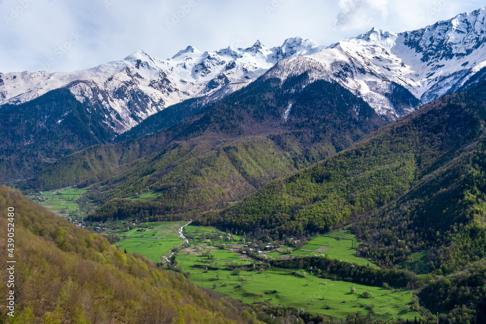 Beautiful view of small village and high mountains in upper Svaneti, Georgia Beautiful view of small village and high mountains in upper Svaneti, Georgia